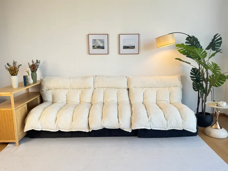 Cream quilted modular plush sofa - three-seater, cloud-like design for modern cozy living rooms