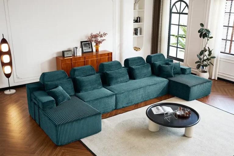 Teal corduroy U-shaped modular compression sofa - five-seater with ottoman, space-saving for large living areas