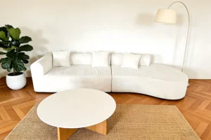 White plush curved modular sofa - L-shaped, minimalist-cozy design for bright living rooms